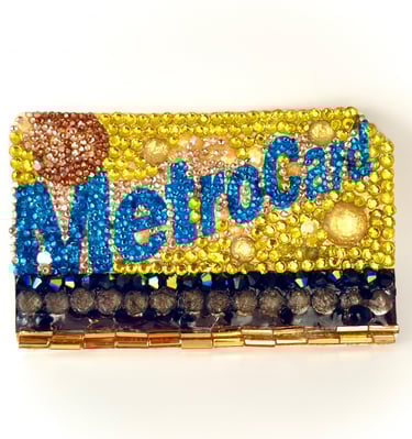 framed work of mterocard covered in crystals