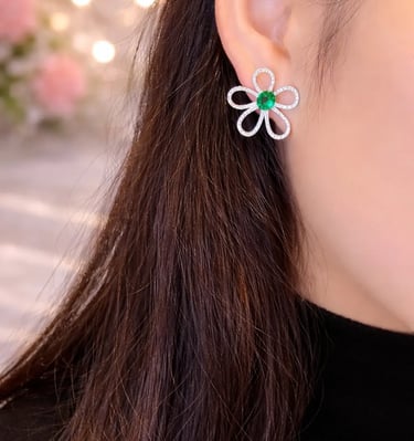 emerald and diamond flower earrings in white gold