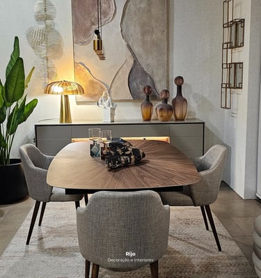 Modern dining room set with walnut table, gray upholstered chairs, and abstract wall art.