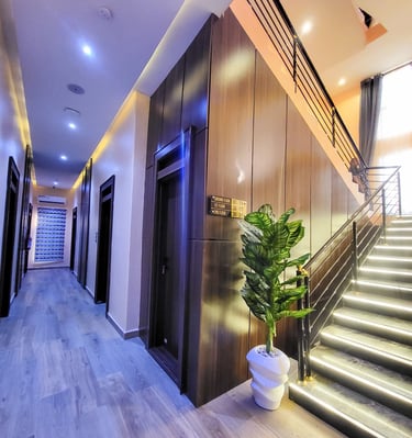 Elegant hotel lobby with plush seating and modern lighting.