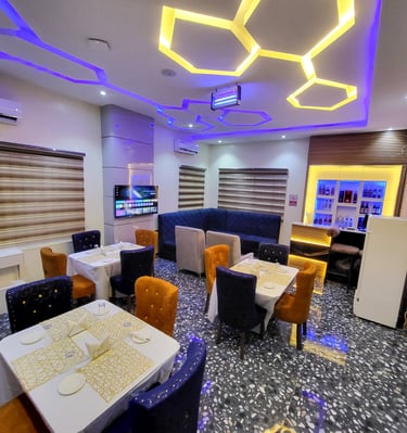 Restaurant and bar area with warm ambiance and tasteful decor.