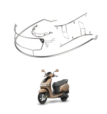 A beige TVS iQube electric scooter shown below a disassembled chrome safety guard set.
