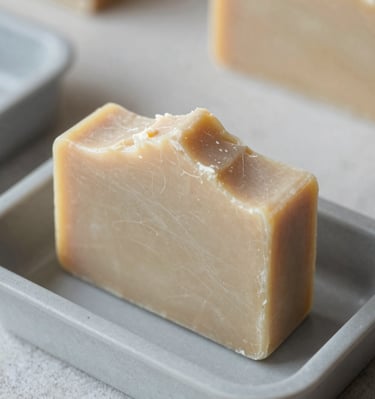 A collection of colorful Savonalpin soaps arranged on a natural linen cloth.