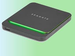 a black and green box with a green light on it