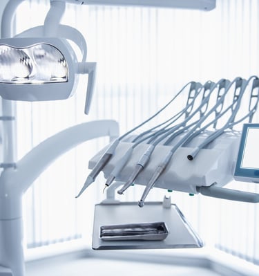 a dental room with a dental chair