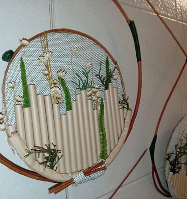 a wall hanging with a picture of a flower