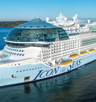 a cruise ship with a cruise ship in the background