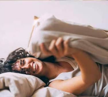 image of happy women finally able to sleep after having massages