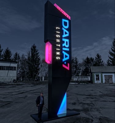 a man standing in front of a sign that says darka