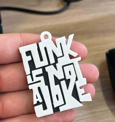 Porte-clés imprimé en 3D sur la base du logo du collectif de danse Funk is not a joke