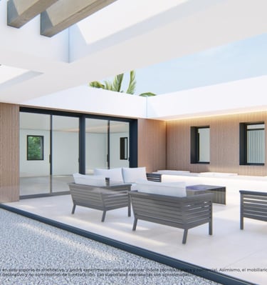 a patio with a couch and chairs and a potted plant