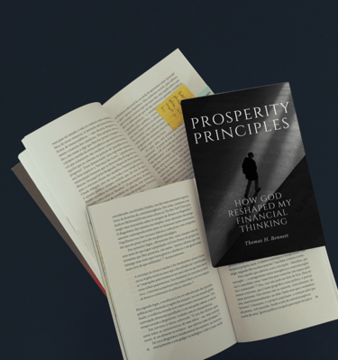 a book with a bookmark and a book on it