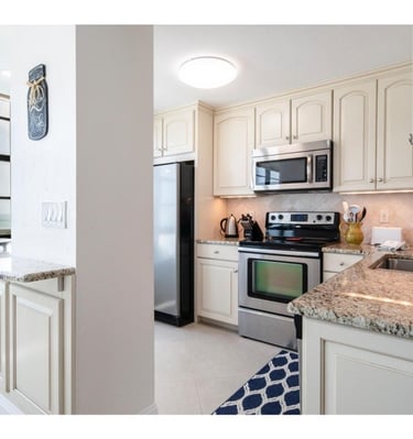 a kitchen with views of the Marco beach