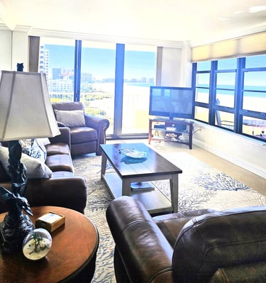 a living room with a large window and a large window