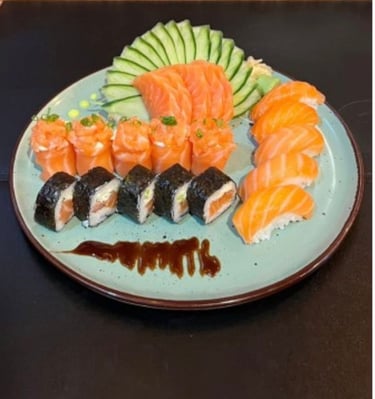 a plate of sushi with a variety of sushi