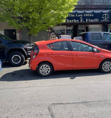 a car parked in front of a building