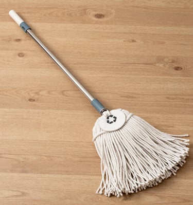 woman in black jacket holding white printer paper