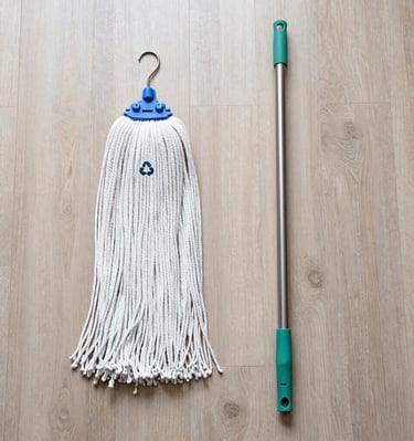 women's in red and white floral long-sleeved dress standing in front of stage