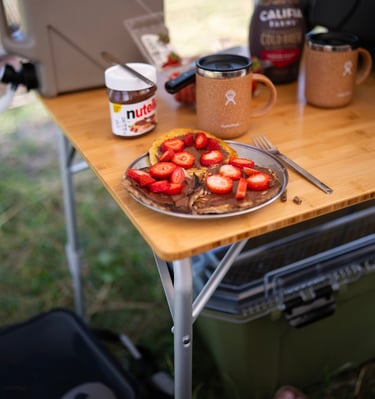 Camp pancakes with Nutella and strawberries
