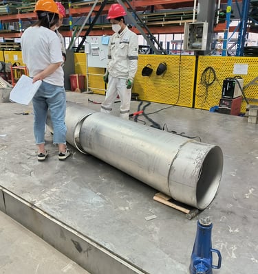 PMI Piping workers are discussing with QC on quality