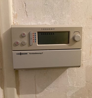 Un thermostat de chauffage à Bérenx