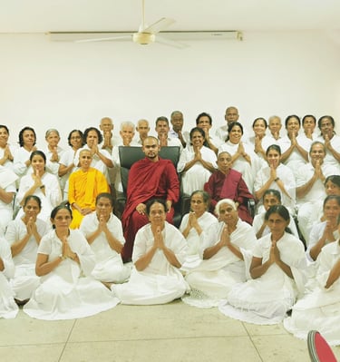 a group of people standing in front of a room