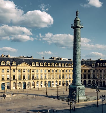 a tall tower with a clock on top of it