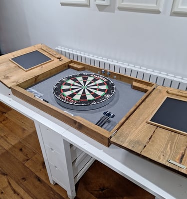a dart board in a dart board cabinet