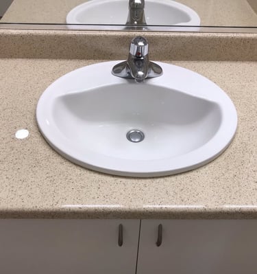 Bathroom countertop reglazing with modern finish