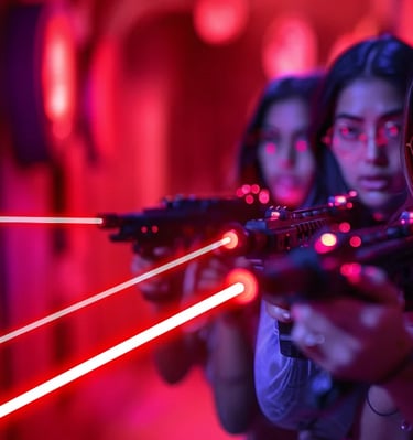a woman holding a laser laser gun