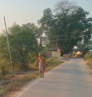 old man stand on the roadside