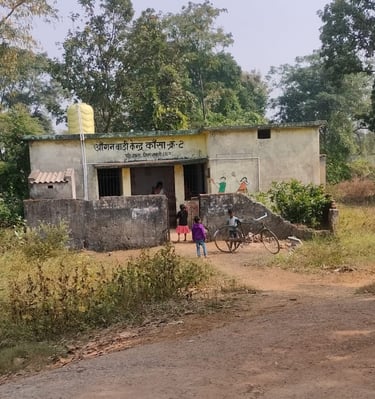 boys stand with cycle front of anganwadi kendar