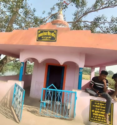 boys sit on temple boundry wall