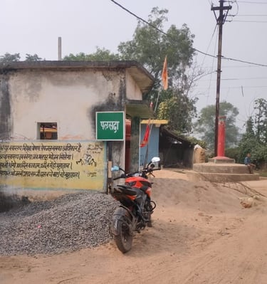 bike front of sign board palasada