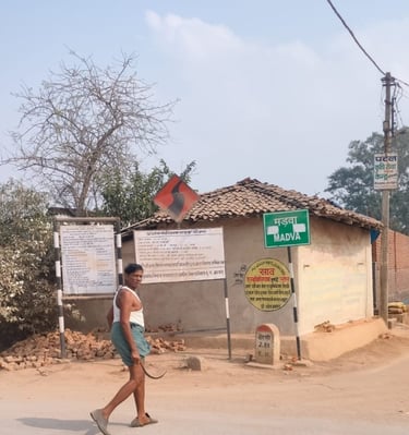 a man front of sign board