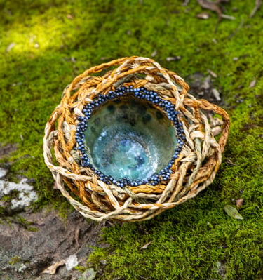 Small ceramic bowl, woven, naturally dyed raffia with glass beads
