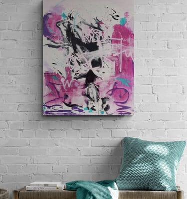 magenta and black painting with wild brush strokes on white brick wall