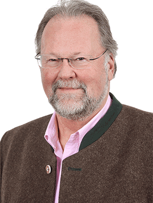 Dr. Heinik, Sportmediziner undPraxisgründer der Hausarzt-Praxis Weidenbusch in Kirchheim bei München