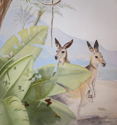 Kids' mural of two life like kangaroos peeking out from behind lush tropical leaves on a beach