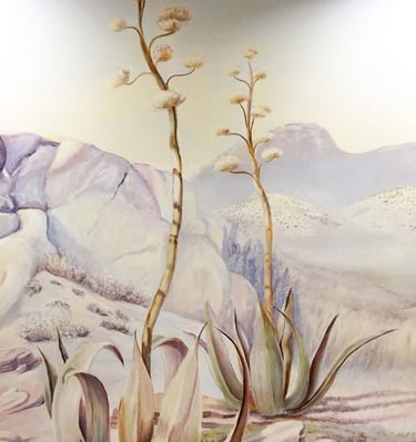  Detail of a mural depicting a blooming agave in the Mojave desert, hand-painted in gentle tones, capturing the morning light