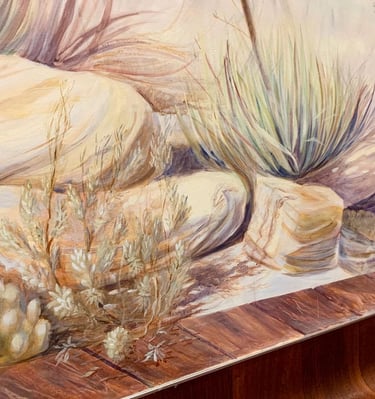 Angled close-up of wood flooring blending into a mural with painted ground cover plants.