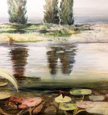 Close up showing the cypress trees within the waters reflection.