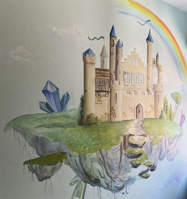Side angle of kid’s mural with a fantasy castle showcasing its position in context to the layout of the room.