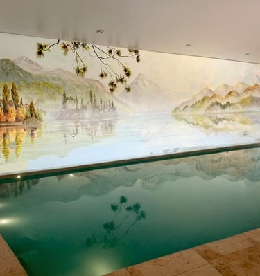 Hand-painted New Zealand lake mural evoking serenity in a luxury spa setting.