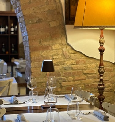 a table with a lamp and a lamp on it