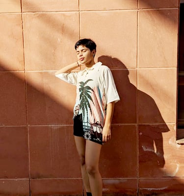 Tropical palm leaf print on modal silk for resort wear