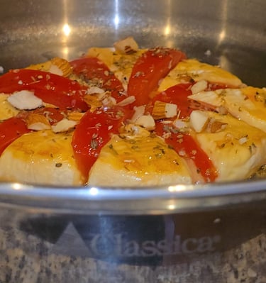 queso brie derretido con miel y tomates y con ajo