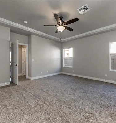 an empty room of a custom home
