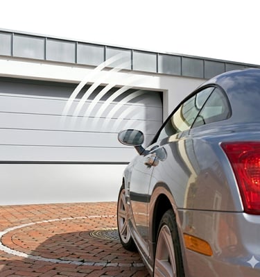 Automatic sectional garage door opening for a car with a wireless remote sensor signal.