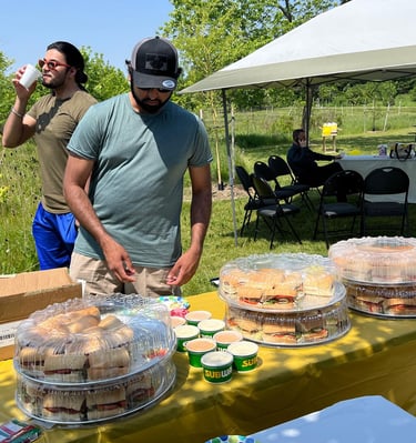 A Baig Security Employee getting a food at the table